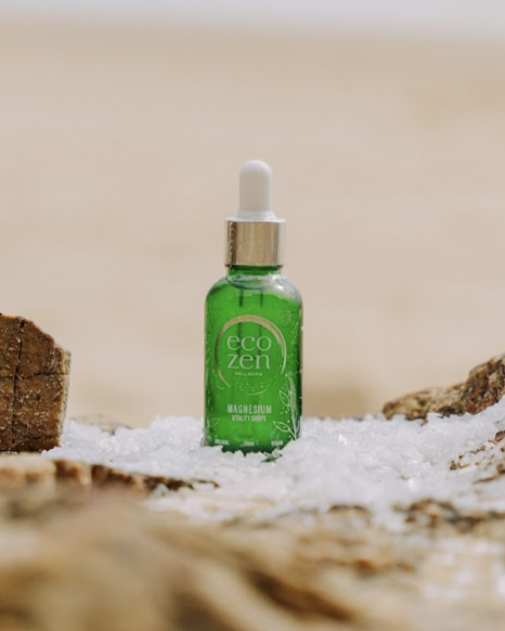 green bottle of magnesium oil